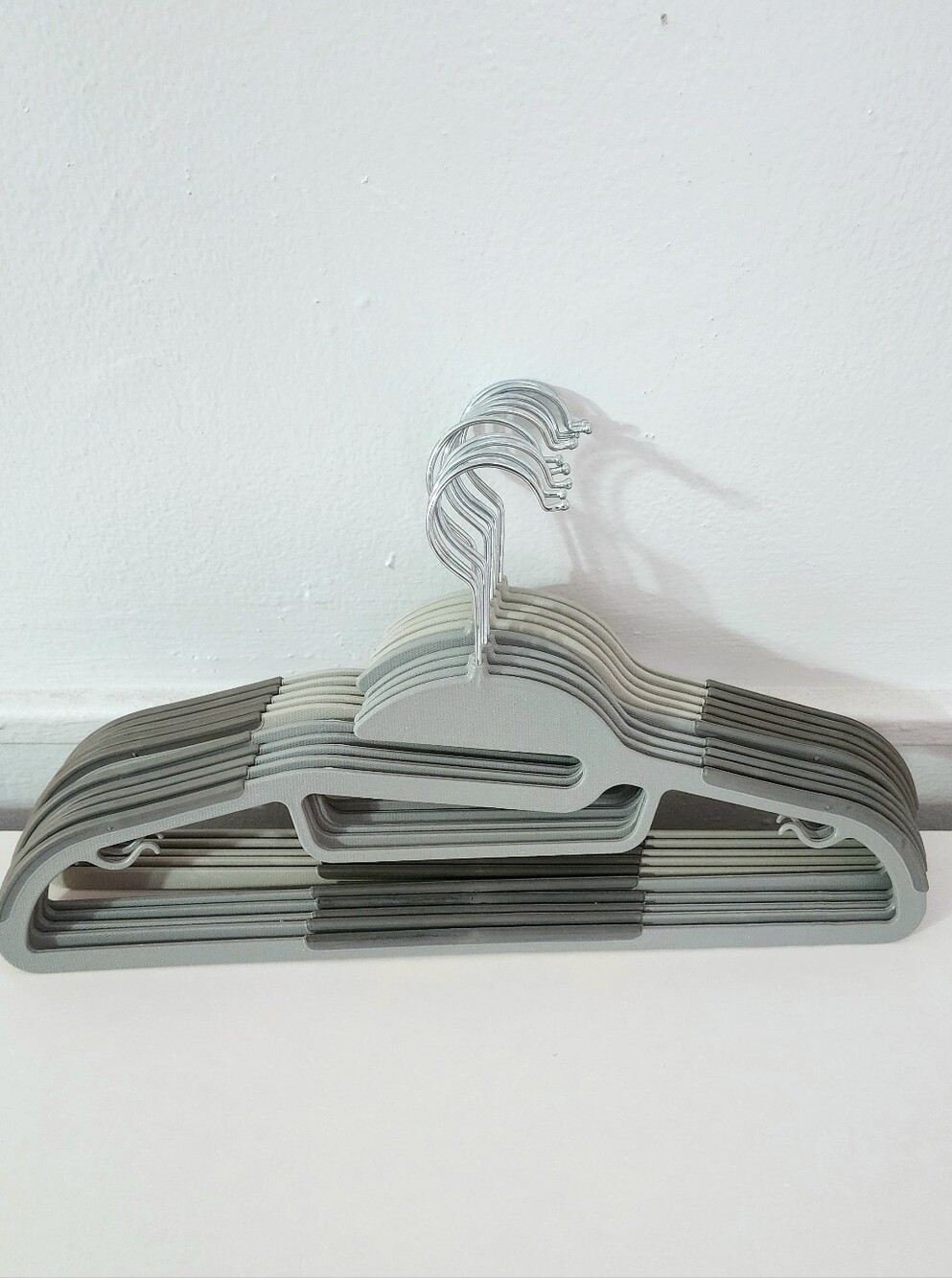 10 Slim Non-Slip Plastic Hangers in Light Gray